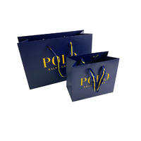 Custom luxury clothing packaging shopping blue paper bag with cotton handle
